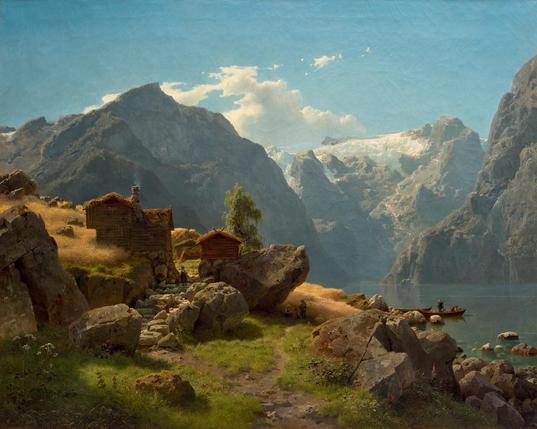 Late summer morning in a fjord landscape with a small settlement surrounded by rocks and small golden fields reaching down the hill until the shore line. Two children are standing in the shade on a small path leading between the wooden houses, roofs covered with grass and moss. Massive mountain peaks with near vertical slopes in the background. A large glacier on one of them. Bright hazy day with light reflecting on individual blades of grass, leaves, presumably still covered in dew.