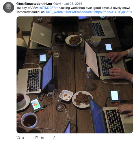 Screenshot of an old tweet from 23/1/2016 incl. a photo with a top-down view of a large kitchen table with 7x laptops, 7x STM32 dev boards (w/ LCD screen), some headphones, cookies, almonds, wine glasses and tea cups...

The tweet reads: "1st day of ARM #STM32F7 hacking workshop over, good times & lovely crew! Tomorrow audio! cc @ST_World @ARMEmbedded"